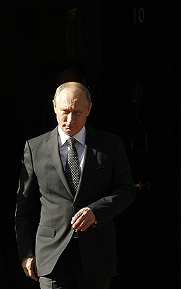 Russia's President Vladimir Putin leaves Downing Street, in central London